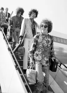Jimi Hendrix arrives with members of his band The Jimi Hendrix Experience