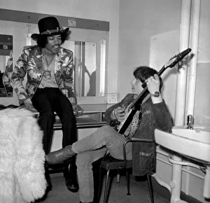 Jimi Hendrix with unknown man on the date of his new release with Curtis Knight - Hush
