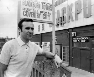 00244 Prints: Jimmy Armfield football player captain Blackpool FC pictured outside Bloomfield Road