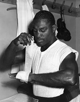 Jimmy Carter, former light weight boxing champion seen in action during training at Toby