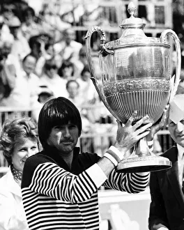 00199 Prints: Jimmy Connors seen here celebrating after winning the 1975 Queens Tennis championship in