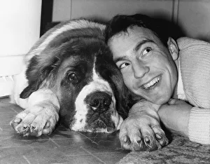 St Bernard Prints: Jimmy Greaves seen here at his Hornchurch home today with his St Bernard dog Bruno which