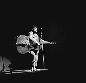 Jimmy Logan on stage with his double bass during a rehearsal for the Royal Varierty