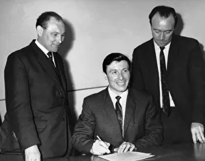 00349 Prints: Jimmy McIlroy (centre) new signing for Stoke City Football Club