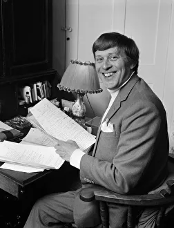 00571 Prints: Jimmy Perry, Scriptwriter, pictured working on Dads Army scripts, at home in Westminster