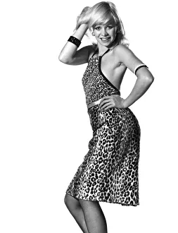 00043 Prints: Jo Howard modelling halter neck animal print dress. November 1973 P008458