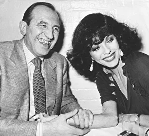 Ties Prints: Joan Collins actress with actor Leonard Rossiter during dinner at The Neal Street