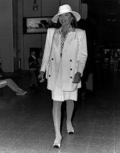 Joan Collins Actress at Airport departing for Atlanta Georgia USA