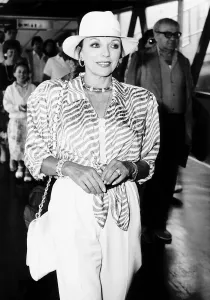 Joan Collins Actress arrives at Heathrow Airport from Nice France A&copy;Mirrorpix