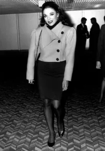 Fashions Prints: Joan Collins Actress at Heathrow Airport arriving from Los Angeles, March 1989