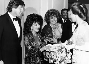 Glamourous Prints: Joan Collins actress meets the Princess Royal at the Four Star Golf Tournament Ball along