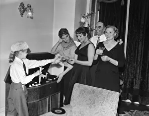 Brother Prints: Joan Collins, actress, pictured at home in London with her parents