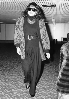 Joan Collins actress starred in Dynasty arrives at Heathrow from Los Angeles