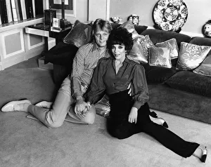 Joan Collins Actress with her Swedish playboy husband Peter Holm December 1983