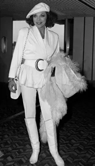 Boots And Shoes Prints: Joan Collins British actress arriving at Heathrow from Los Angeles in January 1988