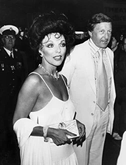 01415 Collection: Joan Collins and husband Ron Kass at premiere of The Stud - April 1978