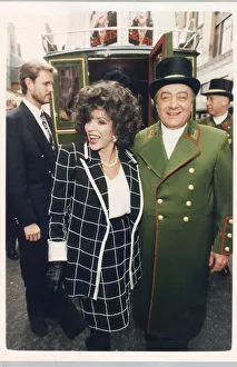 JOAN COLLINS AND MOHAMMED AL FAYED OUTSIDE HARRODS 22 / 07 / 1999