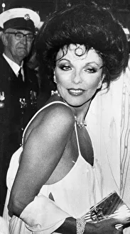 Author Prints: Joan Collins at premiere of The Stud wearing low cut evening gown - April 1978