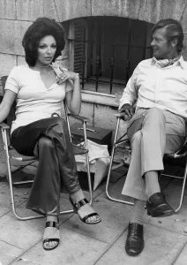 Author Prints: Joan Collins and Roger Moore during filming of The Persuaders TV series - June 1970
