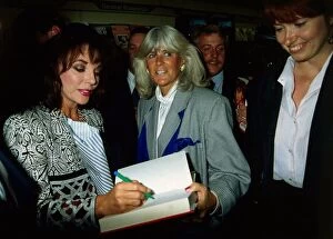 Images Dated 1st June 1989: Joan Collins signing book for Nancy Smith June 1989