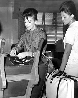 Joan Collins and sister Jackie Collins at London Airport - September 1960