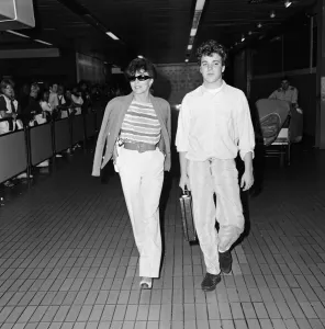 01085 Prints: Joan Collins with her son Sacha, 17, arriving at Heathrow from Los Angeles