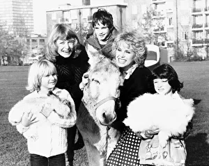 Joanna Lumley acterss with Sue Cook during an appeal for Children In Need