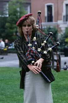 Images Dated 1st June 1989: Joanna Lumley actress June 1989 trying to play bagpipes
