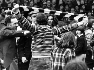 00565 Prints: Jock Stein shouting at pitch invading supporter May 1977