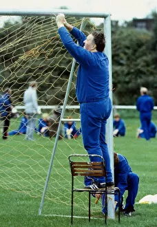 Images Dated 1st January 1985: Jock Stein tying up nets to goals 1985