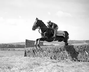 Images Dated 3rd July 2012: Jockey Fred Winter working out on the Downs. 15th July 1954