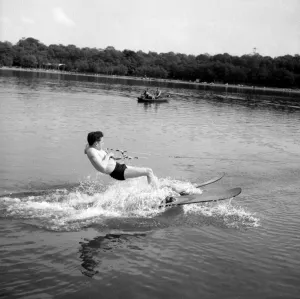 Jockey Lester Piggott enjoys some time off with a session of waterskiing, June 1954