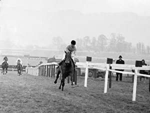 Jockey Pat Taaffe brings Arkle into the last straight before the last fence home on his