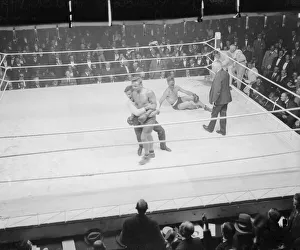Joe Beckett walks away after knocking out Frank Goddard in the British Boxing Board of