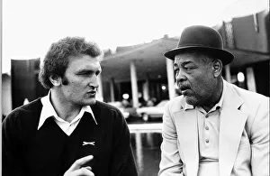 Joe Bugner British heavyweight boxer talking with former world champion Joe Louis outside