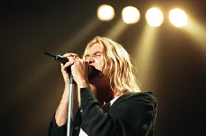 00544 Prints: Joe Elliott of Def Leppard performing live at the NEC Birmingham. 16th November 1996