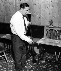 00585 Prints: Joe Goodluck starts on a yard of ale at his local pub October 1964