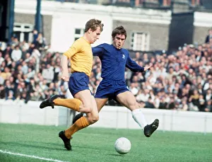 Joe Royle playing for Everton against Chelsea David Webb attempting to tackle him