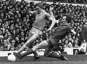 Challenge Prints: Joey Jones of Liverpool slides in to tackle Peter Barnes of Manchester City during