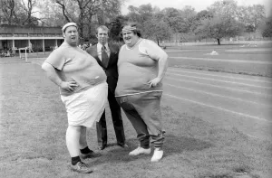Working Out Prints: Jogger-nauts: John Robinson sports writer with Colin Taylor jogging in Battersea Park