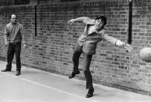 Richard Davies Prints: John Alderton actor appearing in the film version of Please Sir tries to save a goal as