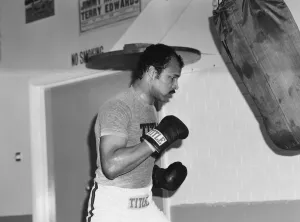 01405 Prints: John Anthony Conteh, MBE (born 27 May 1951) is a British former professional boxer who