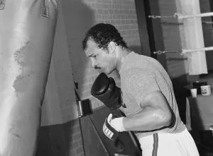 01405 Prints: John Anthony Conteh, MBE (born 27 May 1951) is a British former professional boxer who