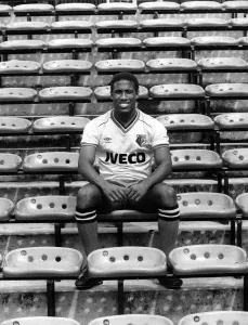 00240 Prints: John Barnes of Watford sitting in the stand at Vicarage Road January 1985