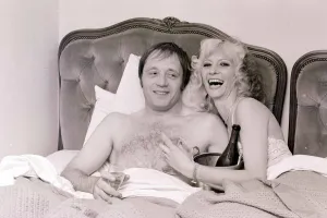 John Bindon actor with girlfriend Vicki Hodge celebrating after winning his court case