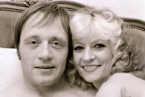 John Bindon actor with girlfriend Vicki Hodge celebrating after winning his court case