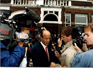 Millionaire Prints: John Bryan surrounded by TV and Press reporters and cameramen