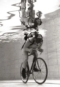 Core69 Prints: John Camm rides bicycle underwater at his local swimming pool with the aid of an
