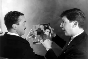 00236 Prints: John Cobbold Dec 1959 Ipswich FC Chairman looks at a picture of the FA cup draw which put