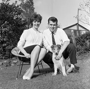 Grass Prints: John Connelly, Burnley FC, pictured at home with wife Sandra & pet dog after being